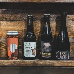 Cztery polskie piwa: puszka Moon Lark, butelki Podpięta, Pinta i Imperial Baltic Porter.